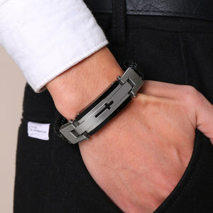 Bracelet en cuir tressé avec breloque en acier inoxydable